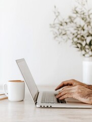 Poster - Modern Workspace Hands Typing on Laptop with Coffee, Notebook, and Smartphone