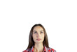 © peshkova - Portrait of a young woman in a red plaid shirt looking upwards, isolated on a white background. Concept of curiosity and thoughtfulness