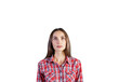 © peshkova - Woman wearing a red plaid shirt gazes upward on an isolated white background, conveying curiosity or contemplation