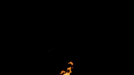 Poster - Fire is burning and creating smoke. The fire is isolated on a black background. This is perfect for compositing visual effects