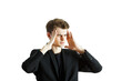© peshkova - Man in asuit touching his temples, showing discomfort. Closeup style on white background. Concept of stress, headache, or tension