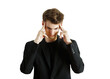 © peshkova - A young man in a suit focusing with fingers on temples, isolated on a white background. Represents stress, concentration, or deep thought