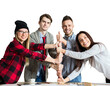 © peshkova - Group of cheerful young adults holding hands together in a teamwork gesture, isolated on white background, symbolizing collaboration and unity