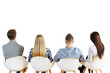 © peshkova - Back view of four seated individuals, two men and two women, on modern chairs on a clean white background. Concept of teamwork or audience