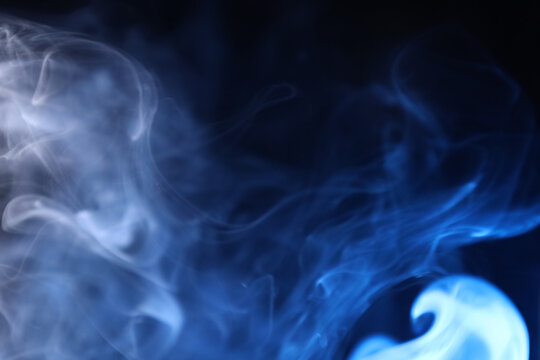 White and blue bright lines, green smoke on a dark background, colourful abstract, vibrant fog, minimalism, line of light, blue sky colour