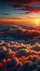 Wall Mural - Vibrant sunset above a sea of clouds, digital art.