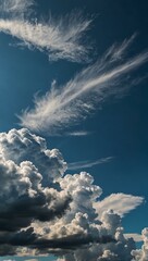 Wall Mural - White cloud with a blue sky backdrop.