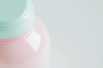 Poster - A close-up of a pink bottle with a green lid, suitable for use in product photography or as an icon