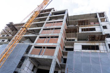 Wall Mural - Massive Building Construction Site with Cranes