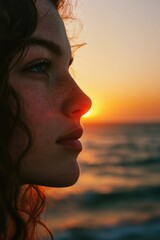 Poster - A person enjoying the scenery with a beautiful sunset behind them