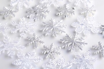 Aufkleber - A close-up shot of a bunch of unique snowflakes arranged on a white background