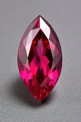 Poster - A pink diamond sitting on a gray surface