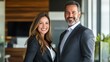 © Alpa - Professional men and women in business attire smiling and confident in office