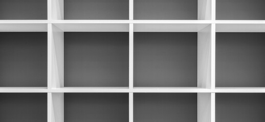 Poster - A white shelf with a red background. The shelf is empty.