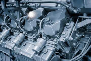 Aufkleber - Big gas engine diesel generator electric power with many wires pipes industrial machine concept background