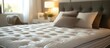 © MetaPixel - Cozy bedroom featuring a comfortable bed with a new mattress against the wall promoting restful and healthy sleep