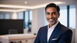 © JohnDesignHub - Another view of a smiling businessman in a sharp suit.