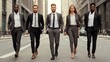 © javu - Professional team confidently walking through a city street in stylish business attire.