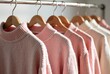 © Adisorn - Pale Pink Knitted Sweater, Metallic Hangers, Autumn Winter Fashion Sale, Store Display