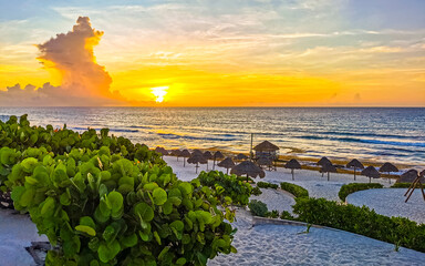 Wall Mural - Caribbean Beach Playa Delfines with amazing sunrise in Cancun Mexico.