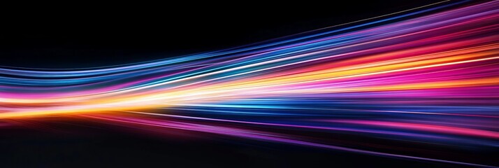 Poster - Captivating and colorful light trails vividly showcase a stunning motion blur effect that creates a dynamic and mesmerizing display against a sleek, visually striking black background