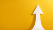 © hardvicore - Glowing white arrow rise up on yellow background. Investment, business growth. Copy space.