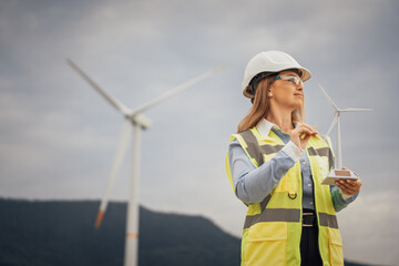 Poster - An engineer presents a detailed wind turbine model, showcasing progress in renewable energy and emphasizing his expertise in sustainable solutions crucial for a greener future for everyone