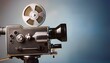 © swan - Vintage movie camera with film reel. Classic filmmaking equipment.