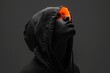 © Boomanoid - Person with orange neon light over eyes