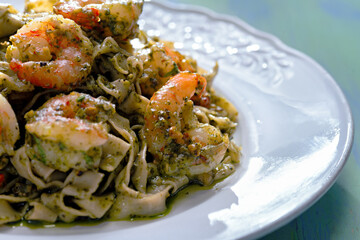 Wall Mural - seafood pasta in pesto sauce