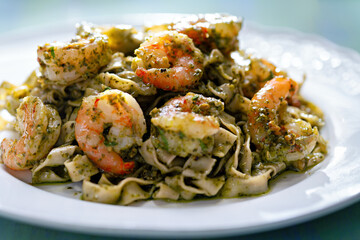 Wall Mural - seafood pasta in pesto sauce