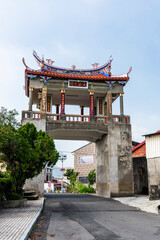 Wall Mural - Building view of the Meinong East Gate Tower in Kaohsiung, Taiwan. The tower was constructed using Qing Dynasty architecture.