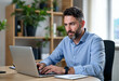 © websense - businessman working on laptop computer