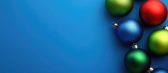 Aufkleber - Colorful Christmas ornaments on a vibrant blue background perfect for holiday greeting cards and festive designs