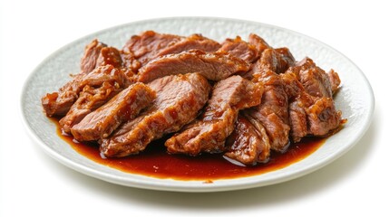Poster - Roast barbecue red pork slices glazed with sauce on a decorative plate against a clean white background