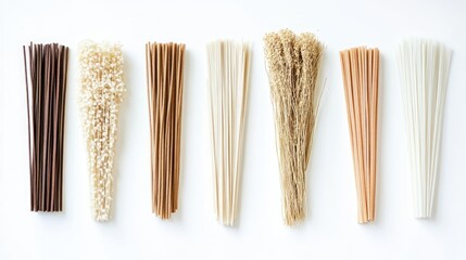 Aufkleber - Variety of Dried Rice Noodles Arranged Neatly on a Clean White Background for Culinary and Food Photography Use
