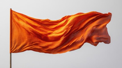 Poster - Waving orange flag isolated on a white background showcasing texture and movement in fabric design for creative projects and visual presentations