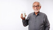 © photostockatinat - Happy Senior Man Enjoying a Glass of Milk