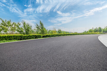 Wall Mural - Empty asphalt road with grass and trees