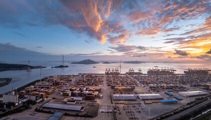 Aufkleber - Aerial view of container port and seaside natural scenery at sunrise