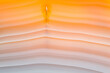 © ADDICTIVE STOCK - Backlit Brazilian Agate Showcasing Warm, Flowing Patterns