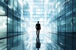© atar - Businessman walking in modern glass corridor. Concept of leadership, vision, and future.