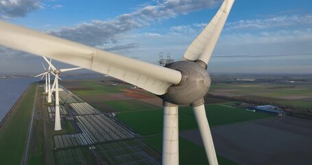 off shore wind turbines in the netherlands. sustainable energy production.