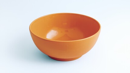 Aufkleber - A vibrant orange bowl  empty and ready to be filled with delicious food.