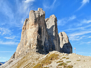 Wall Mural - Tre Cime high iconic rocks in Italian Dolomites autumn landscape