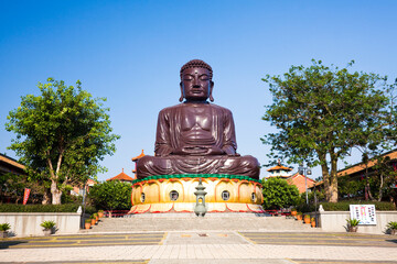 Wall Mural - The Giant Buddha statue is in the Baguashan Scenic Area in Changhua City, Taiwan.