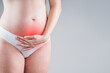 © staras - Pregnant woman with abdominal pain, risk of premature birth, gray background