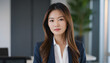 © Dollar - Stylish and Confident Asian Businesswoman with Poised Expression and Neat Hair