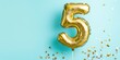 © Ламина Акулова - Helium filled golden number 5 balloon floating against teal background