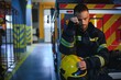© Serhii - depressed and tired firefighter near fire truck